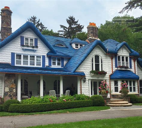 houses with blue shingle roofs